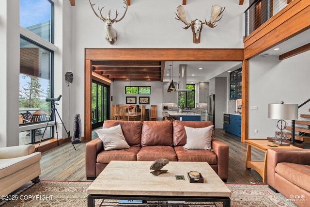 52619 Chumelina Ct, Kasilof, AK 99610 - living room with light wood-style floors and a towering ceiling