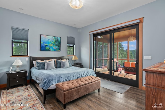 52619 Chumelina Ct, Kasilof, AK 99610 - bedroom with access to exterior and wood finished floors