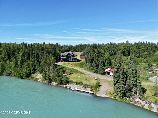 52619 Chumelina Ct, Kasilof, AK 99610 - aerial view of property and surrounding area with a large body of water and a heavily wooded area