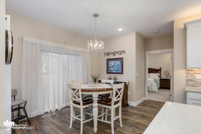 1630 S Corwin Ln, Wasilla, AK 99654 - dining room with dark wood-style floors, a chandelier, recessed lighting, and baseboards