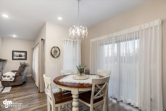 1630 S Corwin Ln, Wasilla, AK 99654 - dining room featuring wood finished floors, baseboards, a chandelier, and recessed lighting