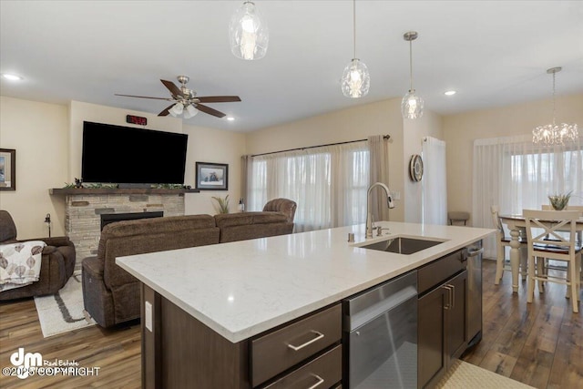 1630 S Corwin Ln, Wasilla, AK 99654 - kitchen with stainless steel dishwasher, a sink, dark wood-type flooring, a ceiling fan, and recessed lighting