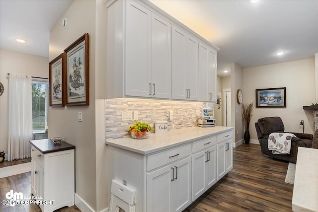 1630 S Corwin Ln, Wasilla, AK 99654 - kitchen with backsplash, dark wood-style flooring, white cabinetry, baseboards, and recessed lighting