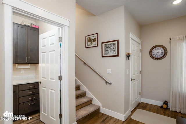 1630 S Corwin Ln, Wasilla, AK 99654 - stairway featuring wood finished floors and baseboards