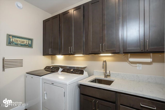 1630 S Corwin Ln, Wasilla, AK 99654 - laundry room featuring washer and clothes dryer and cabinet space