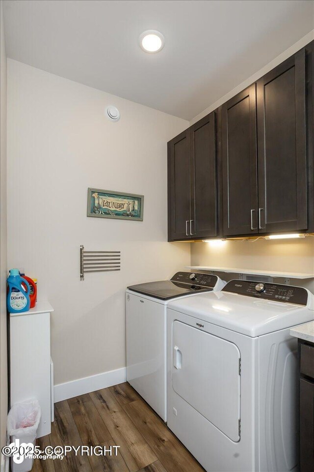 1630 S Corwin Ln, Wasilla, AK 99654 - washroom featuring cabinet space, separate washer and dryer, dark wood-style flooring, and baseboards