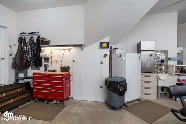 1630 S Corwin Ln, Wasilla, AK 99654 - miscellaneous room featuring concrete floors and an office area
