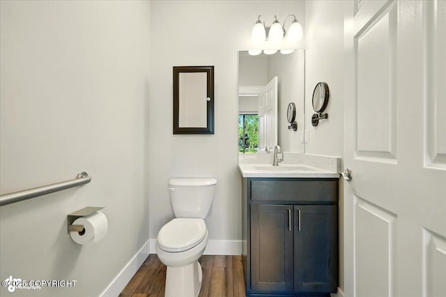 1630 S Corwin Ln, Wasilla, AK 99654 - bathroom featuring vanity and wood finished floors