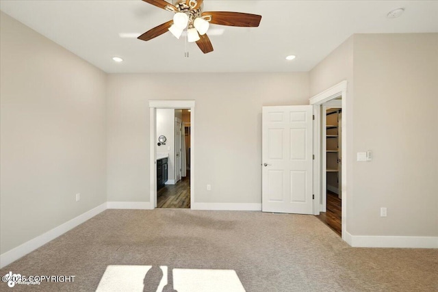 1630 S Corwin Ln, Wasilla, AK 99654 - unfurnished bedroom with carpet floors, recessed lighting, connected bathroom, and a ceiling fan