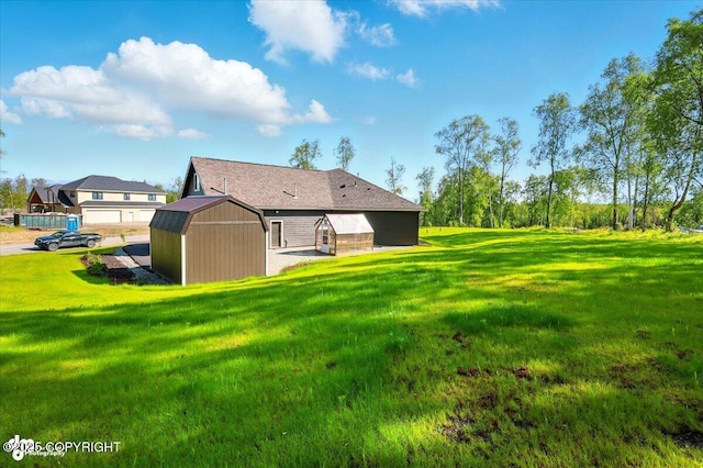 1630 S Corwin Ln, Wasilla, AK 99654 - view of grassy yard with a shed