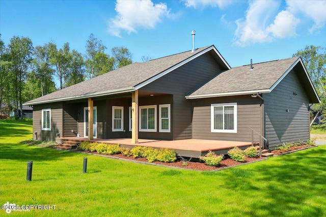 1630 S Corwin Ln, Wasilla, AK 99654 - back of property featuring a yard and roof with shingles
