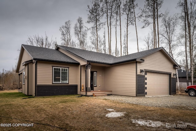 6552 N Michelle Rae St, Wasilla, AK 99654 - ranch-style home featuring driveway, a shingled roof, an attached garage, and a front yard