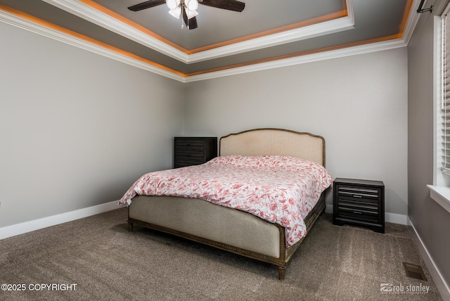 6552 N Michelle Rae St, Wasilla, AK 99654 - carpeted bedroom with a tray ceiling, crown molding, baseboards, and a ceiling fan