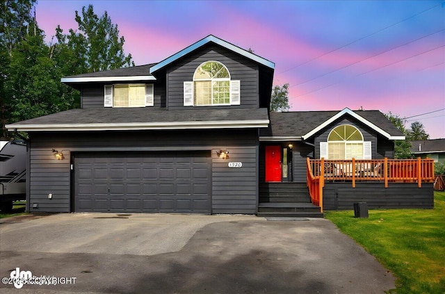 1320 S Felton St, Palmer, AK 99645 - view of front of house featuring a garage, driveway, and a shingled roof