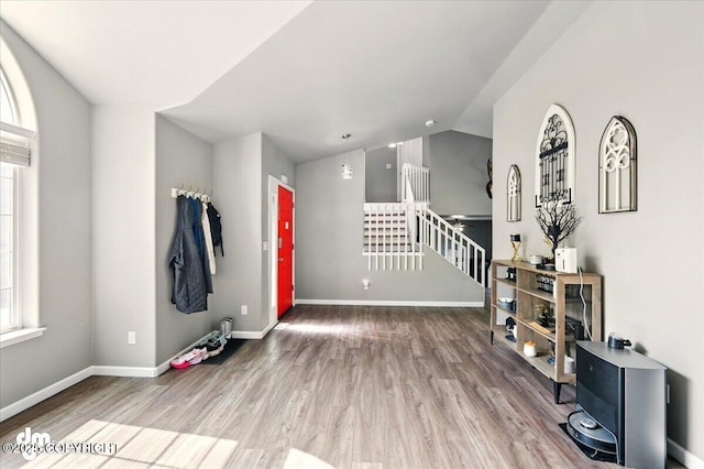 1320 S Felton St, Palmer, AK 99645 - foyer with wood finished floors, stairs, vaulted ceiling, and baseboards