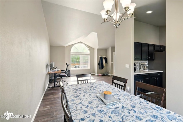 1320 S Felton St, Palmer, AK 99645 - dining space with baseboards, dark wood-style floors, a chandelier, and vaulted ceiling