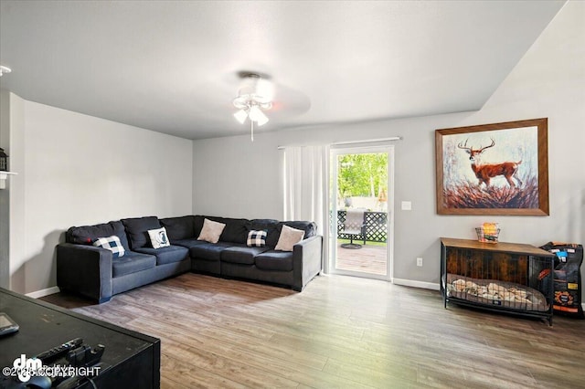 1320 S Felton St, Palmer, AK 99645 - living area with wood finished floors, ceiling fan, and baseboards