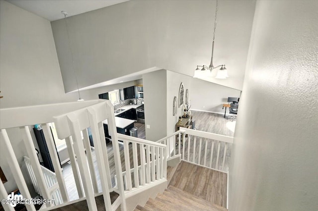 1320 S Felton St, Palmer, AK 99645 - staircase featuring wood finished floors