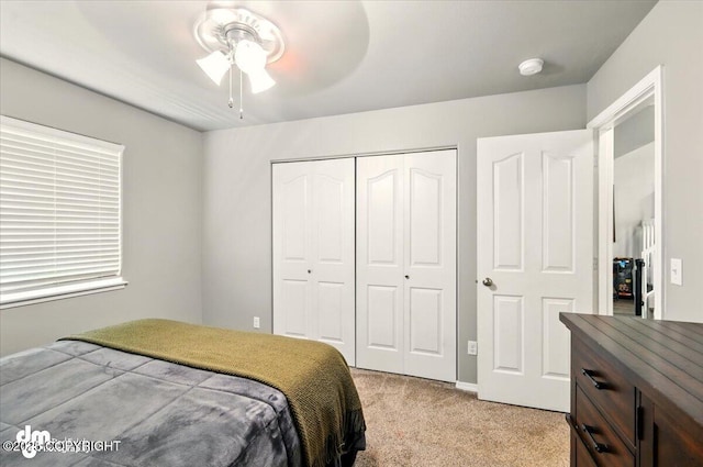1320 S Felton St, Palmer, AK 99645 - bedroom featuring light colored carpet, a closet, and a ceiling fan
