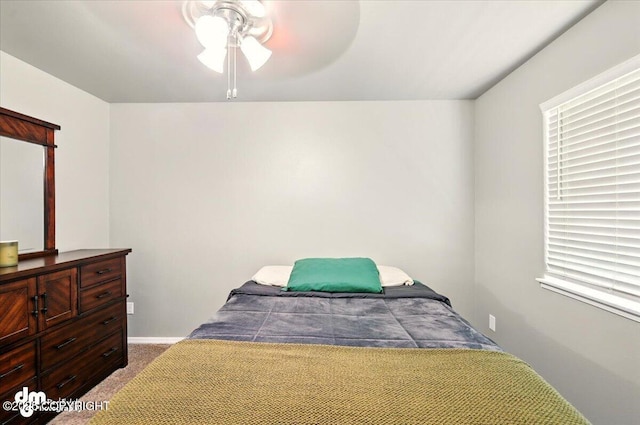 1320 S Felton St, Palmer, AK 99645 - bedroom featuring carpet floors, ceiling fan, and baseboards