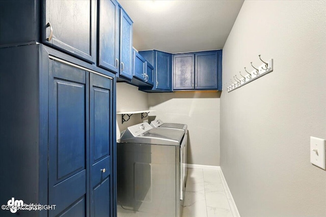 1320 S Felton St, Palmer, AK 99645 - laundry area featuring marble finish floors, washer and dryer, cabinet space, and baseboards