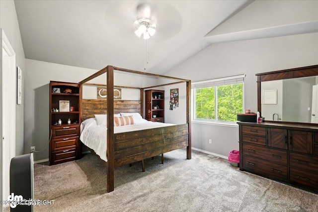 1320 S Felton St, Palmer, AK 99645 - carpeted bedroom with vaulted ceiling and baseboards