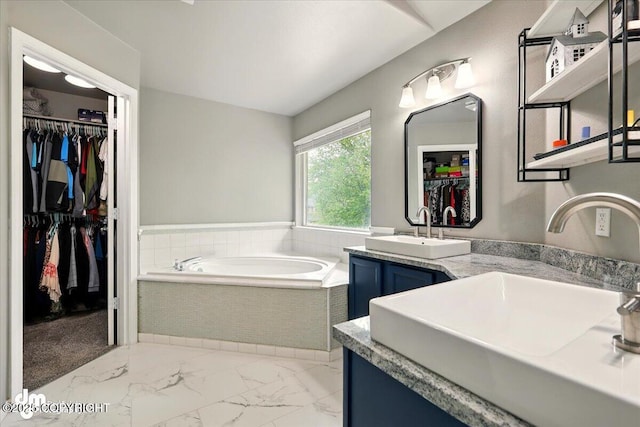 1320 S Felton St, Palmer, AK 99645 - full bath with a bath, marble look tiles, double vanity, and a spacious closet