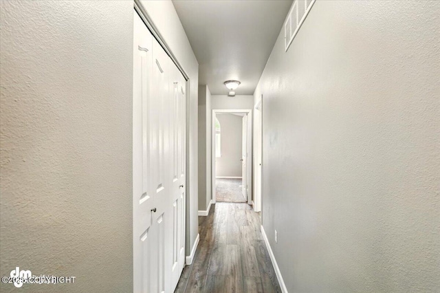 1320 S Felton St, Palmer, AK 99645 - corridor with dark wood finished floors and baseboards