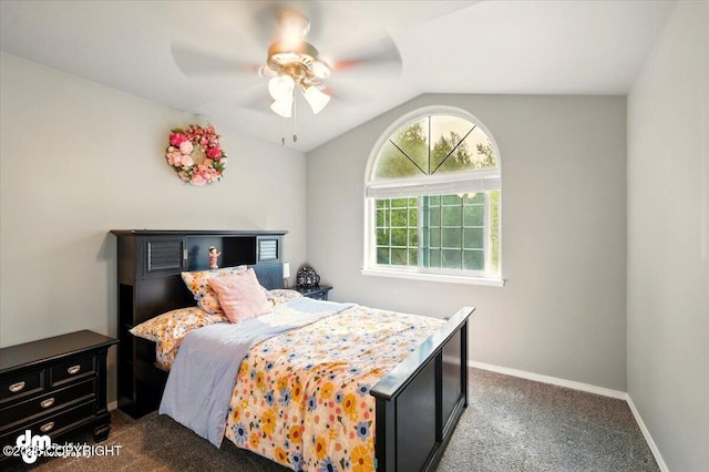 1320 S Felton St, Palmer, AK 99645 - bedroom with vaulted ceiling, dark colored carpet, baseboards, and a ceiling fan