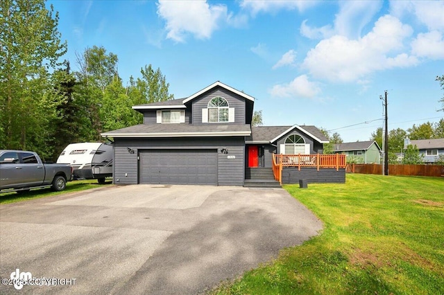 1320 S Felton St, Palmer, AK 99645 - view of front of property featuring an attached garage, driveway, and a deck