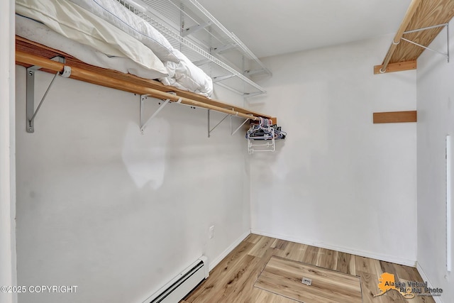 3233 Tayshee Cir, Anchorage, AK 99504 - walk in closet with light wood finished floors