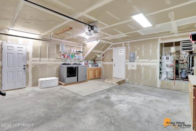 3233 Tayshee Cir, Anchorage, AK 99504 - garage featuring washing machine and dryer, water heater, electric panel, and a garage door opener