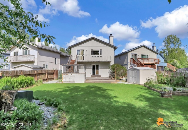3233 Tayshee Cir, Anchorage, AK 99504 - rear view of property featuring stairway, a chimney, and a balcony