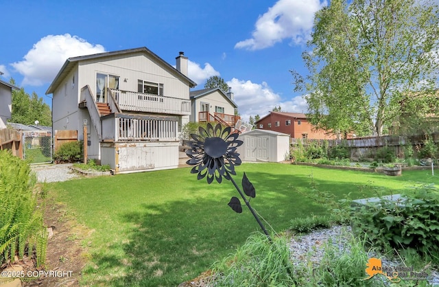 3233 Tayshee Cir, Anchorage, AK 99504 - back of house featuring a chimney and a deck