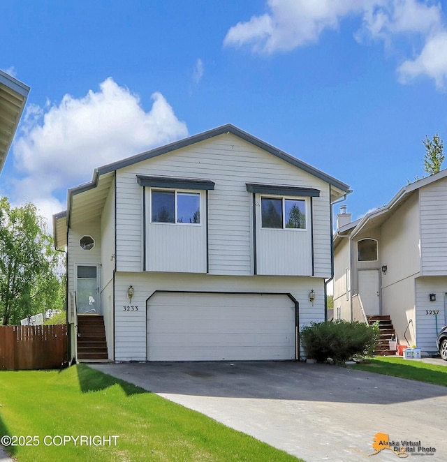 3233 Tayshee Cir, Anchorage, AK 99504 - view of front of property with an attached garage and concrete driveway