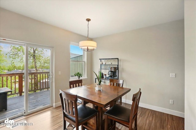 20182 Eagles Nest Ct # 5B, Eagle River, AK 99577 - dining area with wood finished floors and baseboards