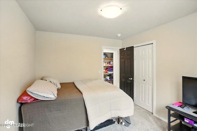 20182 Eagles Nest Ct # 5B, Eagle River, AK 99577 - bedroom with a closet, light colored carpet, and baseboards