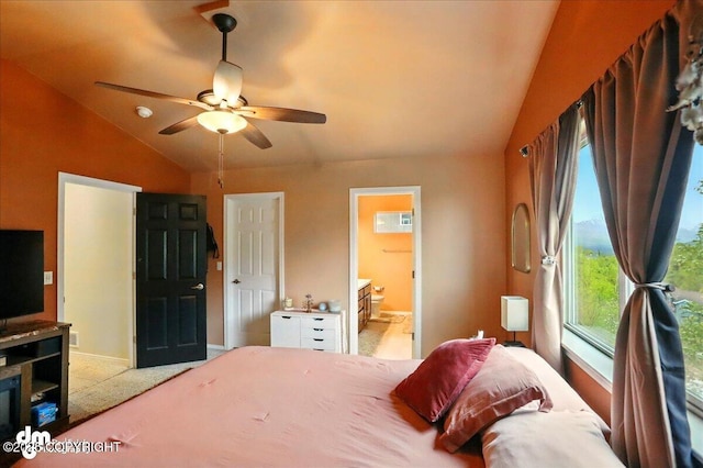 20182 Eagles Nest Ct # 5B, Eagle River, AK 99577 - carpeted bedroom with vaulted ceiling, ensuite bath, and a ceiling fan
