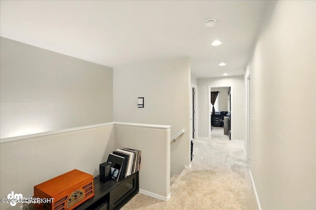 20182 Eagles Nest Ct # 5B, Eagle River, AK 99577 - hall featuring an upstairs landing, light carpet, recessed lighting, and baseboards