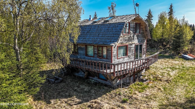 21572 Twilight St, Ninilchik, AK 99639 - rear view of house featuring a high end roof and a wooden deck