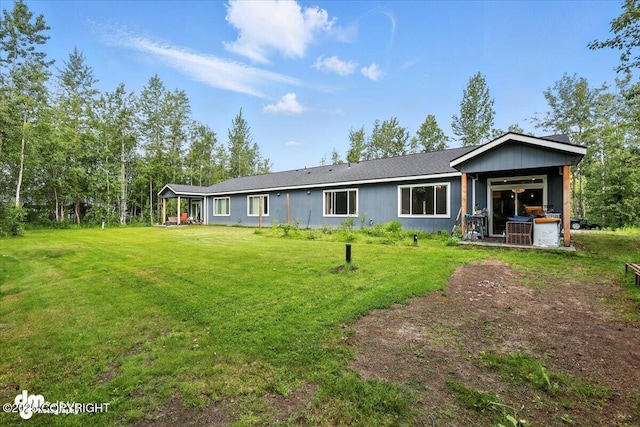 1521 N Kerry Ln, Wasilla, AK 99654 - view of front of home featuring a front yard and a patio