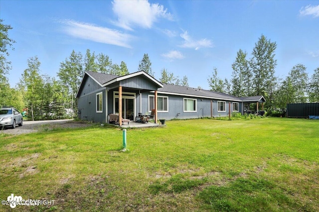 1521 N Kerry Ln, Wasilla, AK 99654 - rear view of property featuring a yard