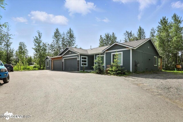 1521 N Kerry Ln, Wasilla, AK 99654 - single story home featuring a garage, asphalt driveway, and roof with shingles