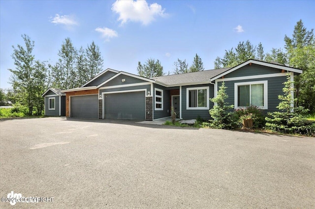 1521 N Kerry Ln, Wasilla, AK 99654 - ranch-style home featuring an attached garage and driveway