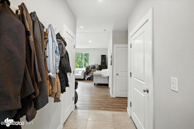 1521 N Kerry Ln, Wasilla, AK 99654 - hallway with light tile patterned flooring and recessed lighting