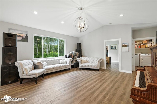 1521 N Kerry Ln, Wasilla, AK 99654 - living area with independent washer and dryer, a chandelier, lofted ceiling, wood finished floors, and recessed lighting