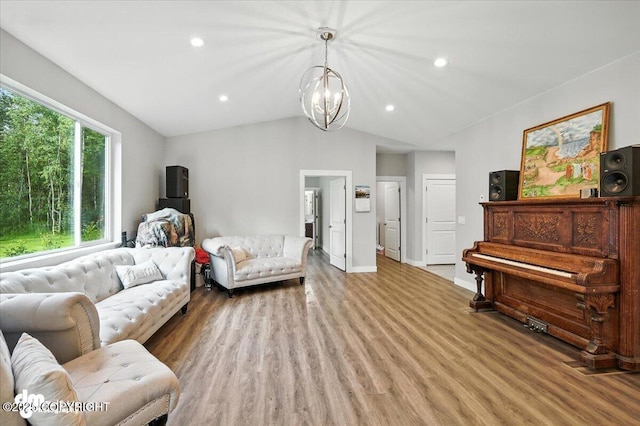 1521 N Kerry Ln, Wasilla, AK 99654 - living room featuring light wood-style flooring, a chandelier, vaulted ceiling, and recessed lighting