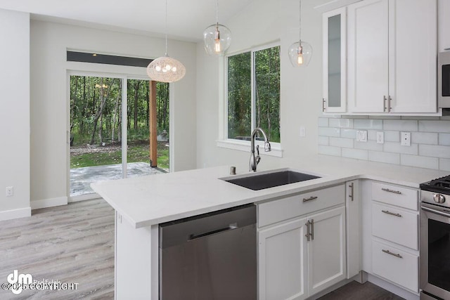 1521 N Kerry Ln, Wasilla, AK 99654 - kitchen with stainless steel appliances, light countertops, and white cabinets