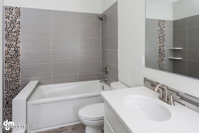 1521 N Kerry Ln, Wasilla, AK 99654 - bathroom with vanity, washtub / shower combination, and wood finished floors