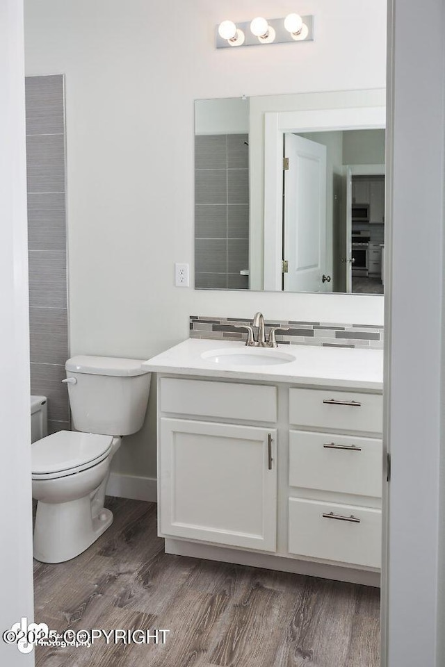 1521 N Kerry Ln, Wasilla, AK 99654 - bathroom featuring vanity and wood finished floors